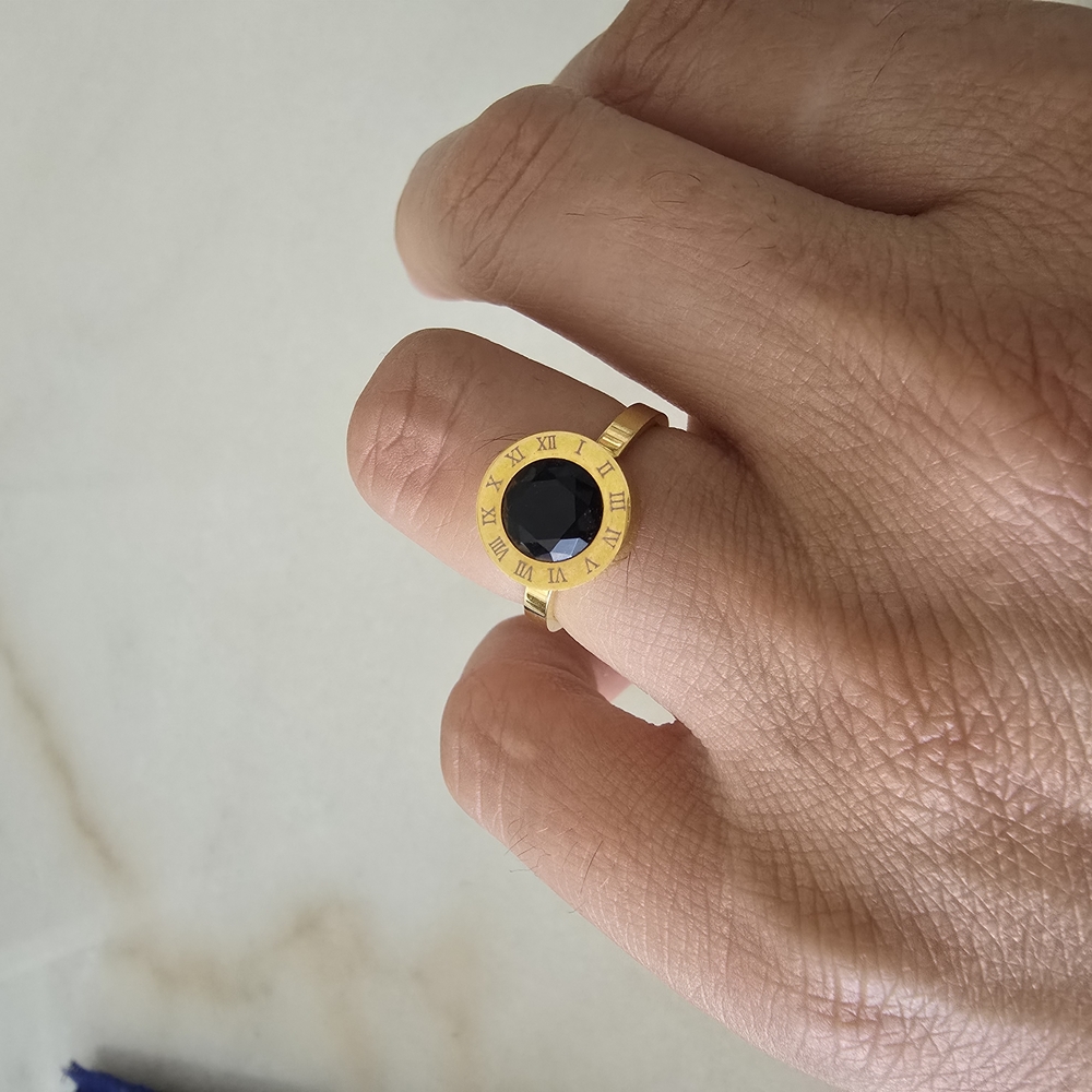 Elegant Gold and Black Ring